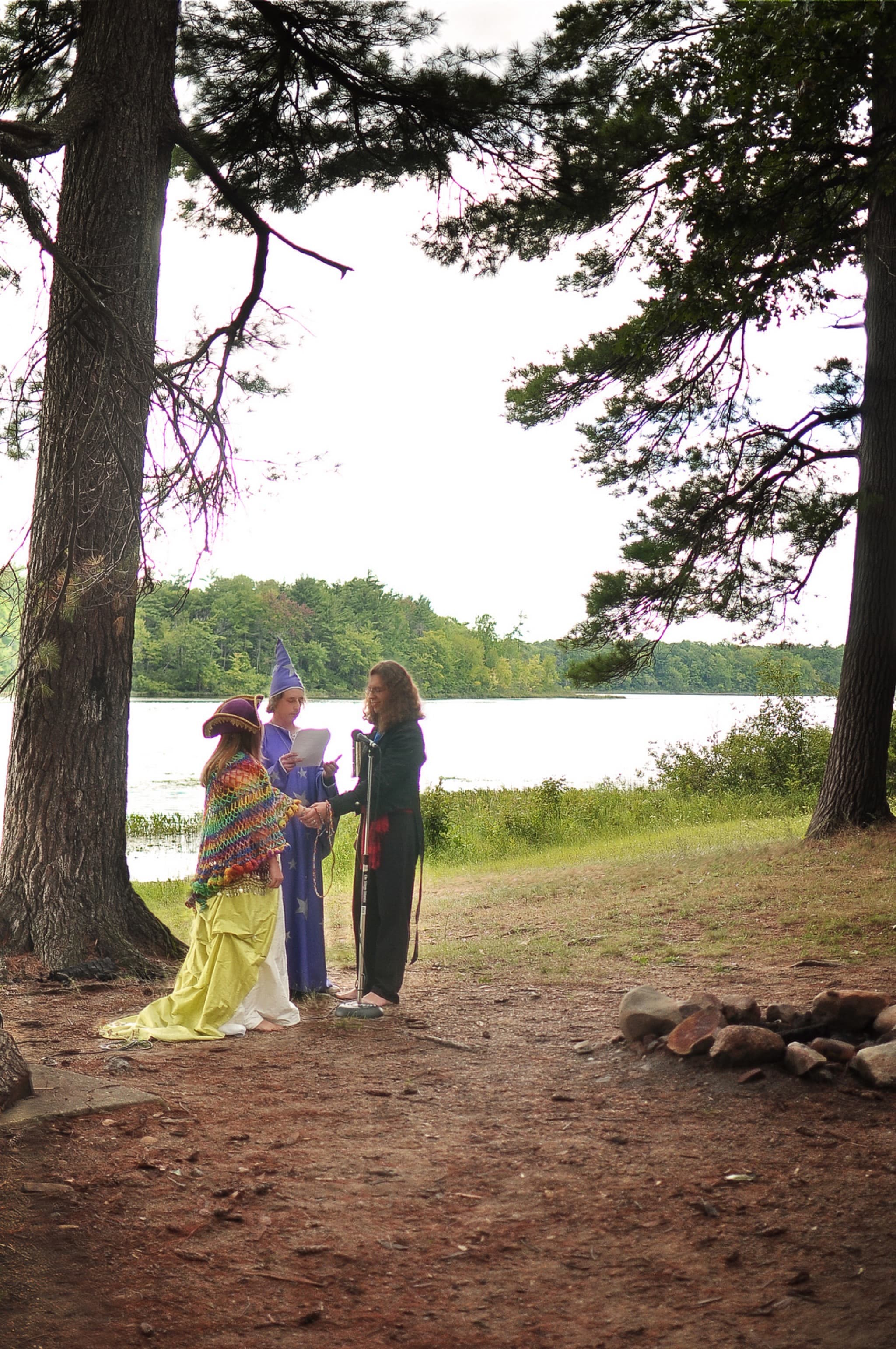 Wedding ceremony under the pines beside Long Lake