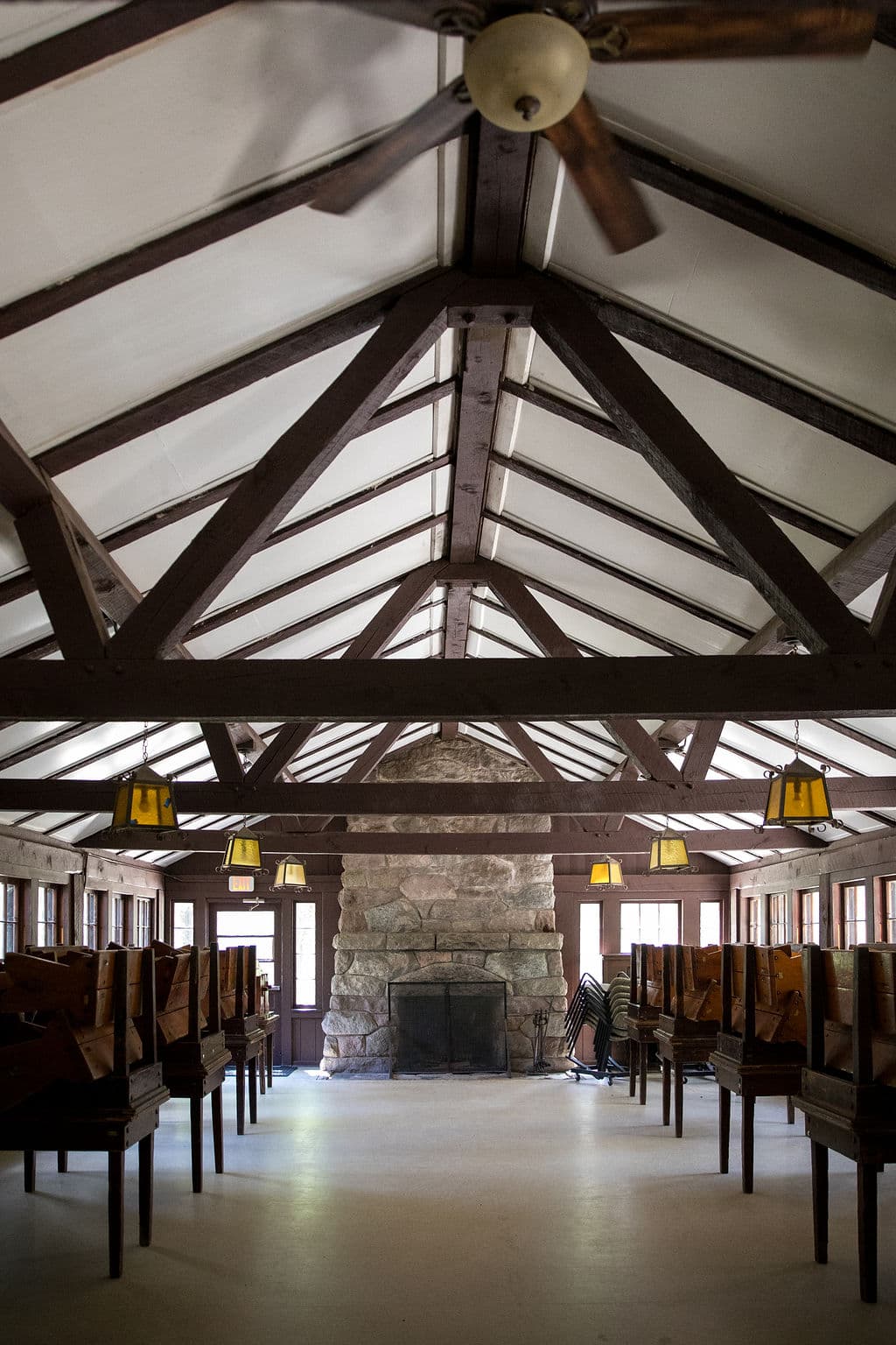 Timber trusses over the dining hall tables