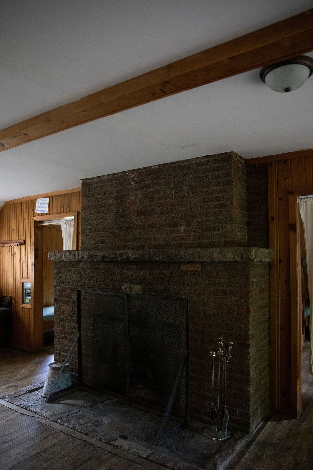 Stone fireplace built by the CCC inside the lodge