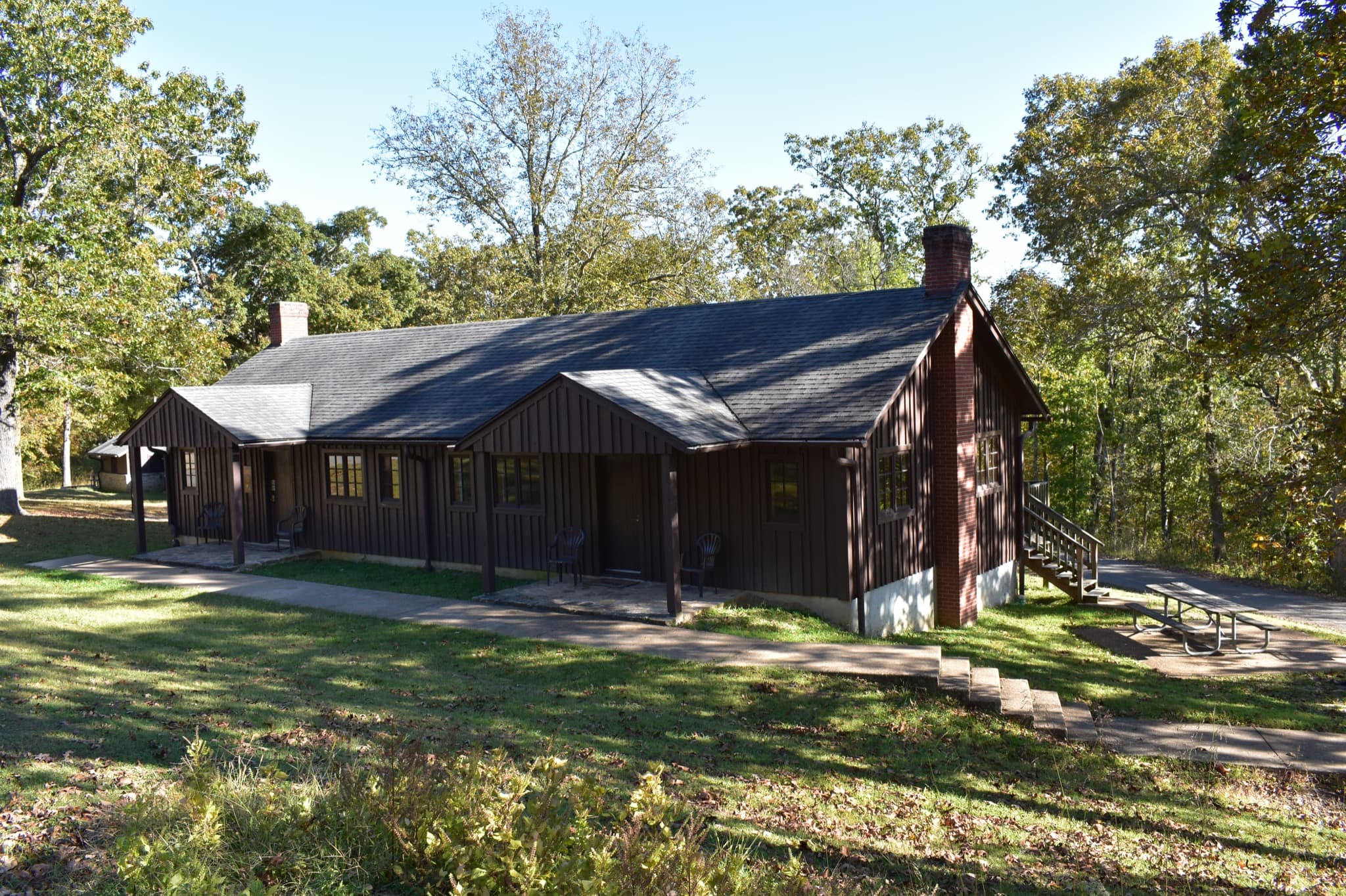 Paired cabins in the forest