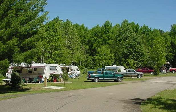 RV campsites along a paved campground loop
