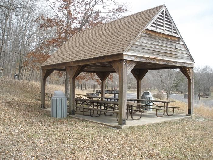 Picnic shelter among bare winter trees at Tipsaw Lake